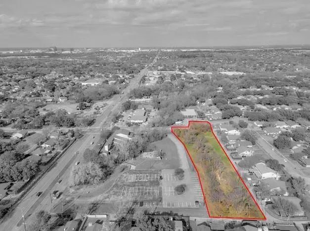 a view of roof with city view