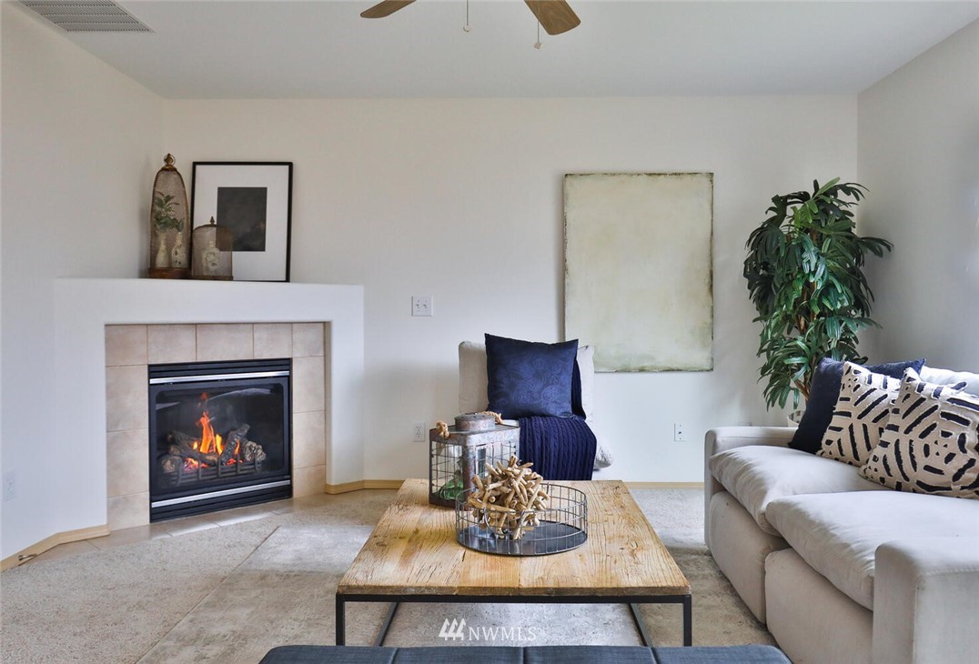 19009 3rd Drive Southeast Bothell, WA 98012 - Photo 5 of 21 a living room with furniture and a fireplace