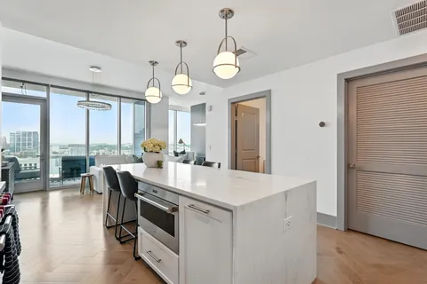 a view of kitchen island and living room