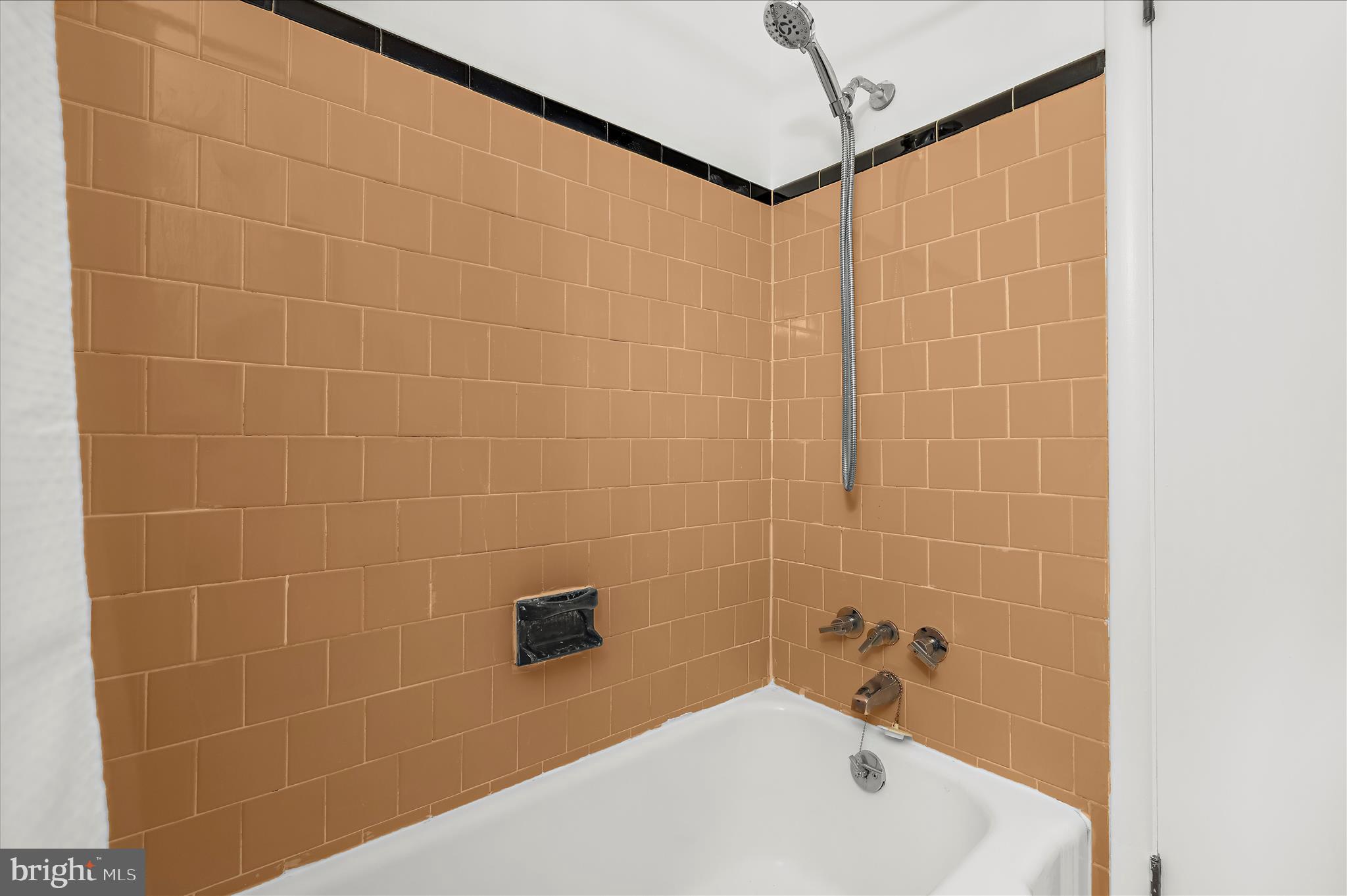 2930 Powder Mill Road Hyattsville, MD 20783 - Photo 21 of 53 a bathroom with a white bathtub