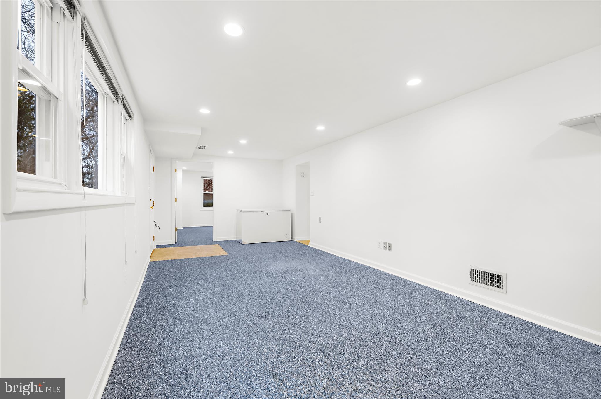 2930 Powder Mill Road Hyattsville, MD 20783 - Photo 31 of 53 an empty room with white walls and windows