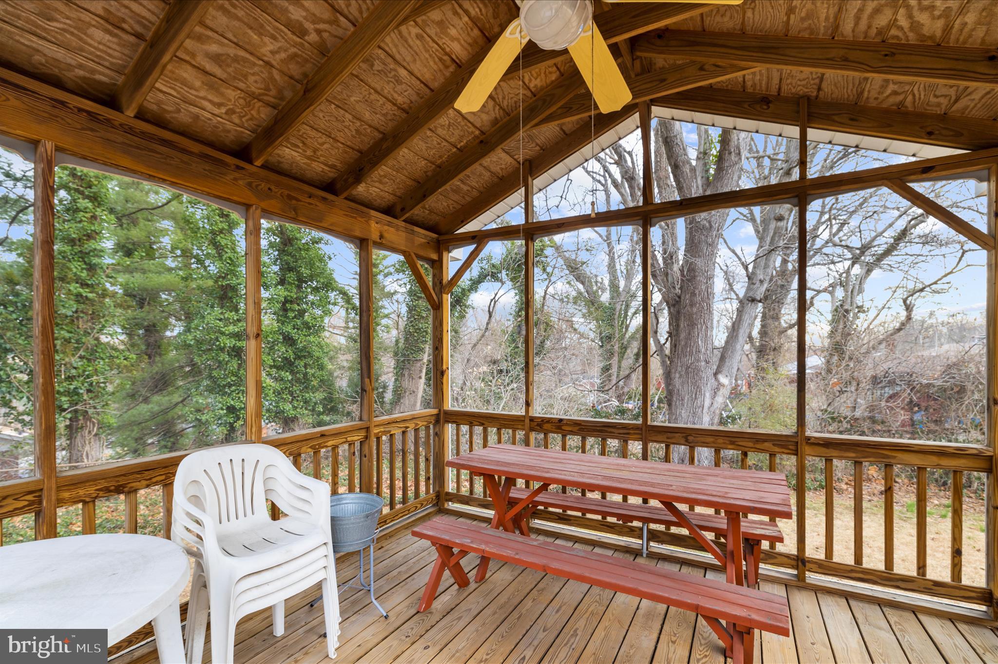 2930 Powder Mill Road Hyattsville, MD 20783 - Photo 45 of 53 a view of a porch with furniture and wooden floor