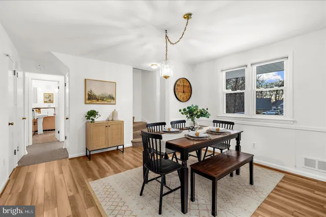 a view of a dining room and a wooden floor