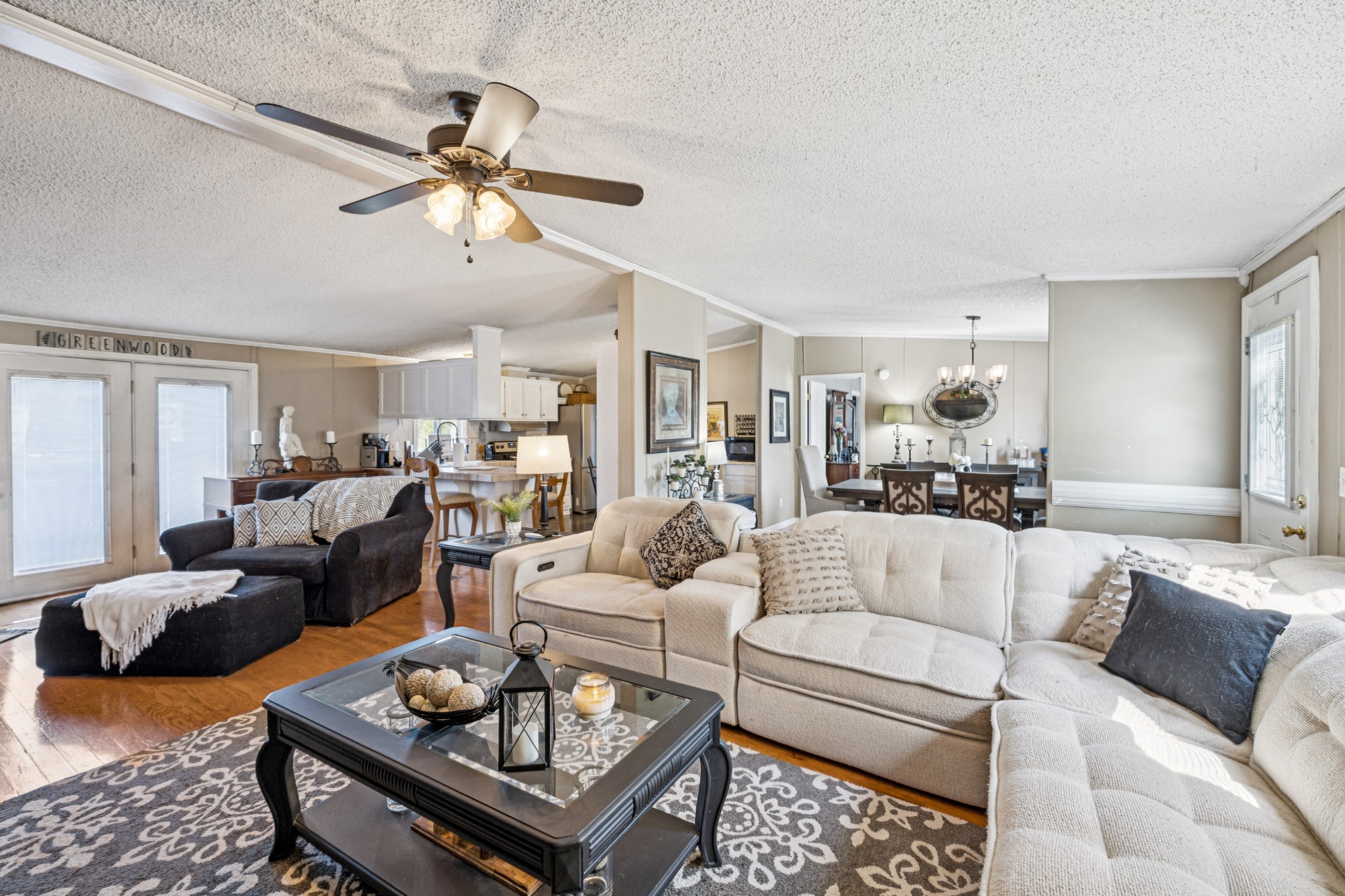 257 Bunker Hill Road Rockvale, TN 37153 - Photo 12 of 38 a living room with furniture and a chandelier
