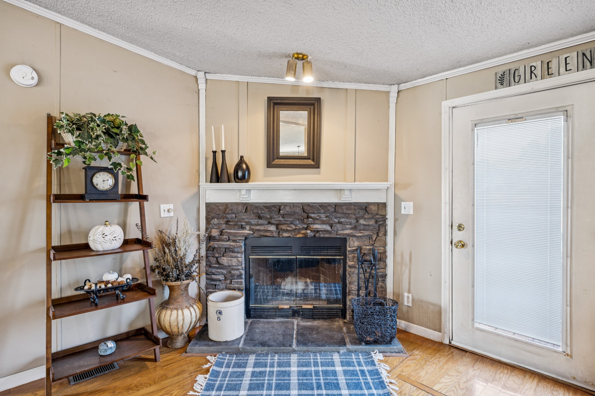 257 Bunker Hill Road Rockvale, TN 37153 - Photo 15 of 38 a living room with furniture and a fireplace