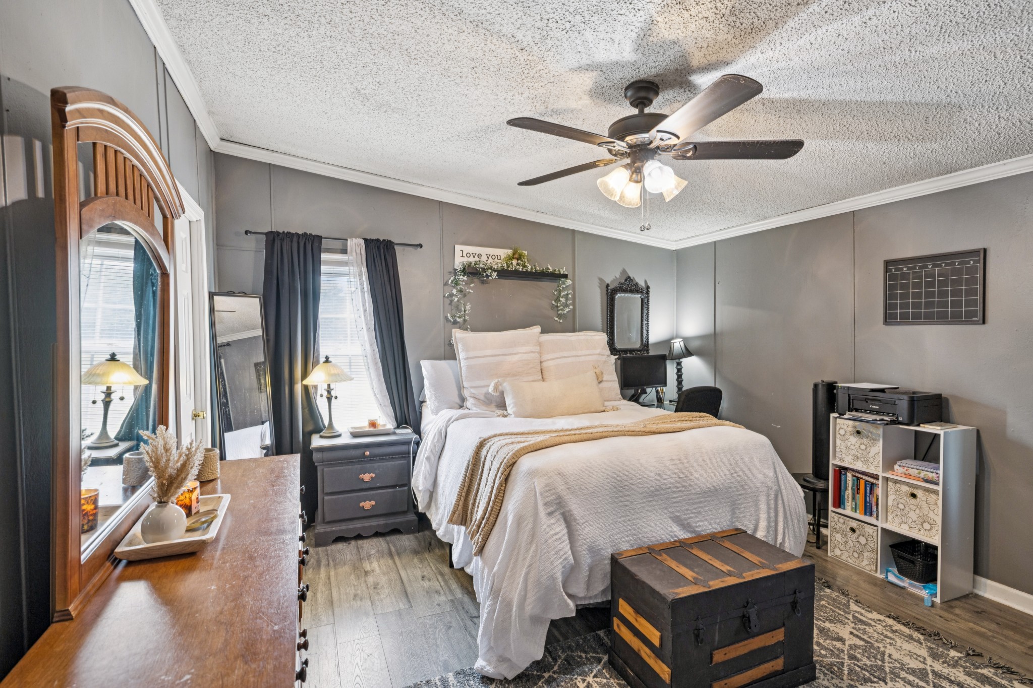 257 Bunker Hill Road Rockvale, TN 37153 - Photo 25 of 38 a bed room with a bed and a chandelier