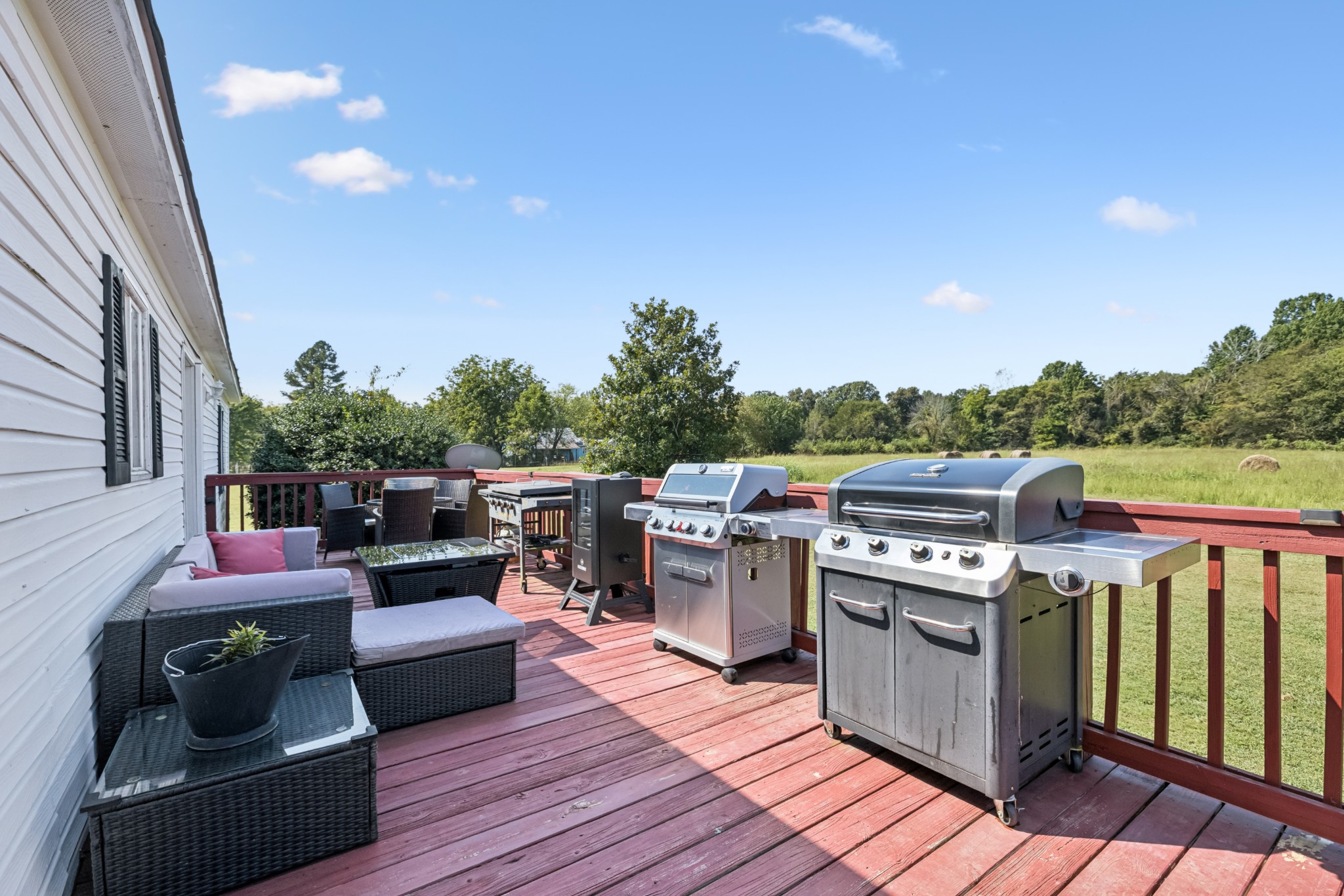 257 Bunker Hill Road Rockvale, TN 37153 - Photo 32 of 38 a roof deck with couches and potted plants