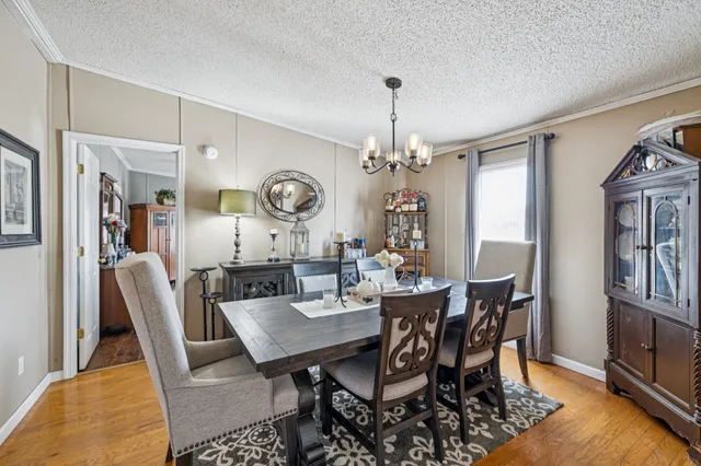 a view of a dining room with furniture