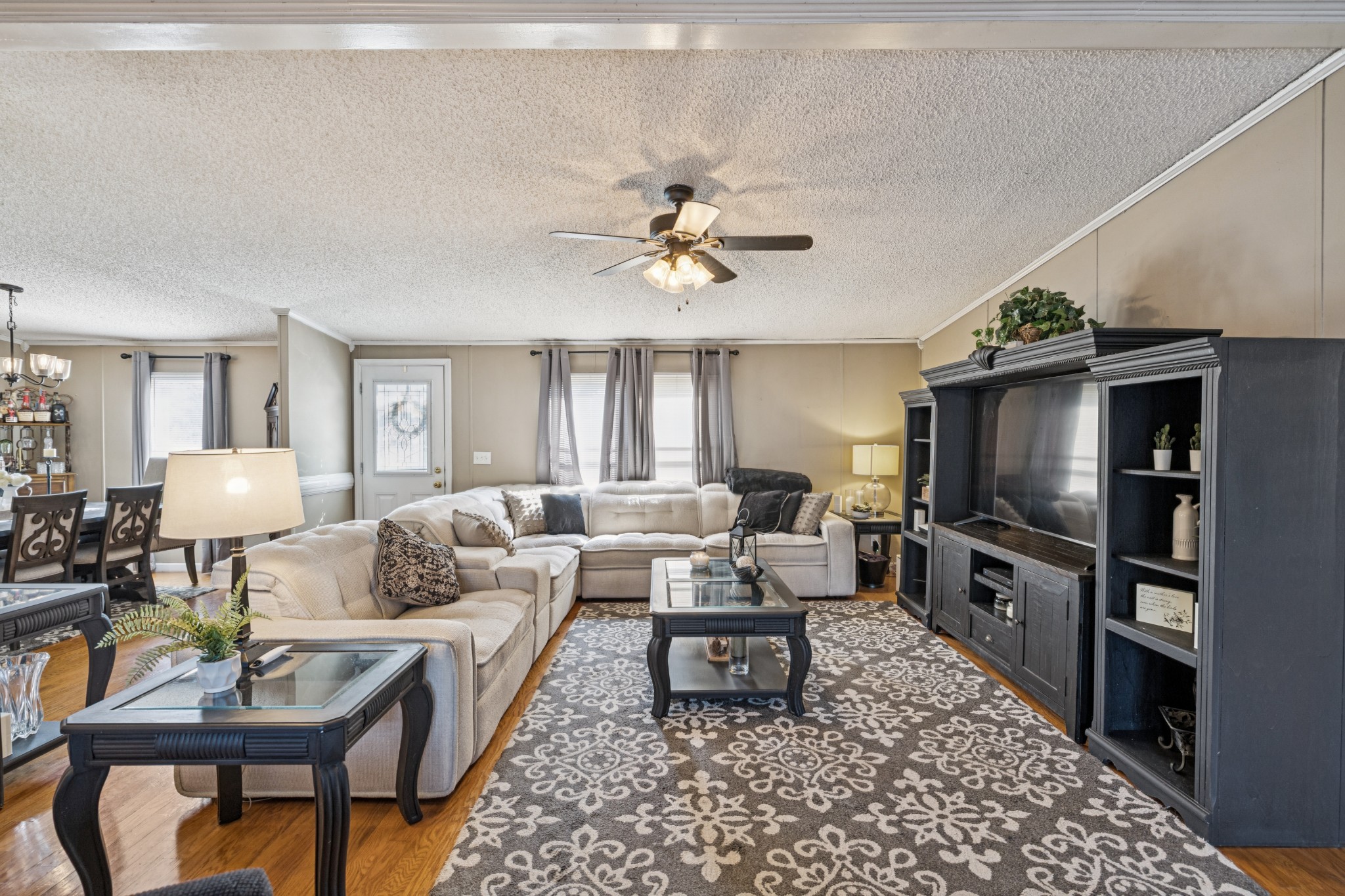 257 Bunker Hill Road Rockvale, TN 37153 - Photo 10 of 38 a living room with furniture and a flat screen tv
