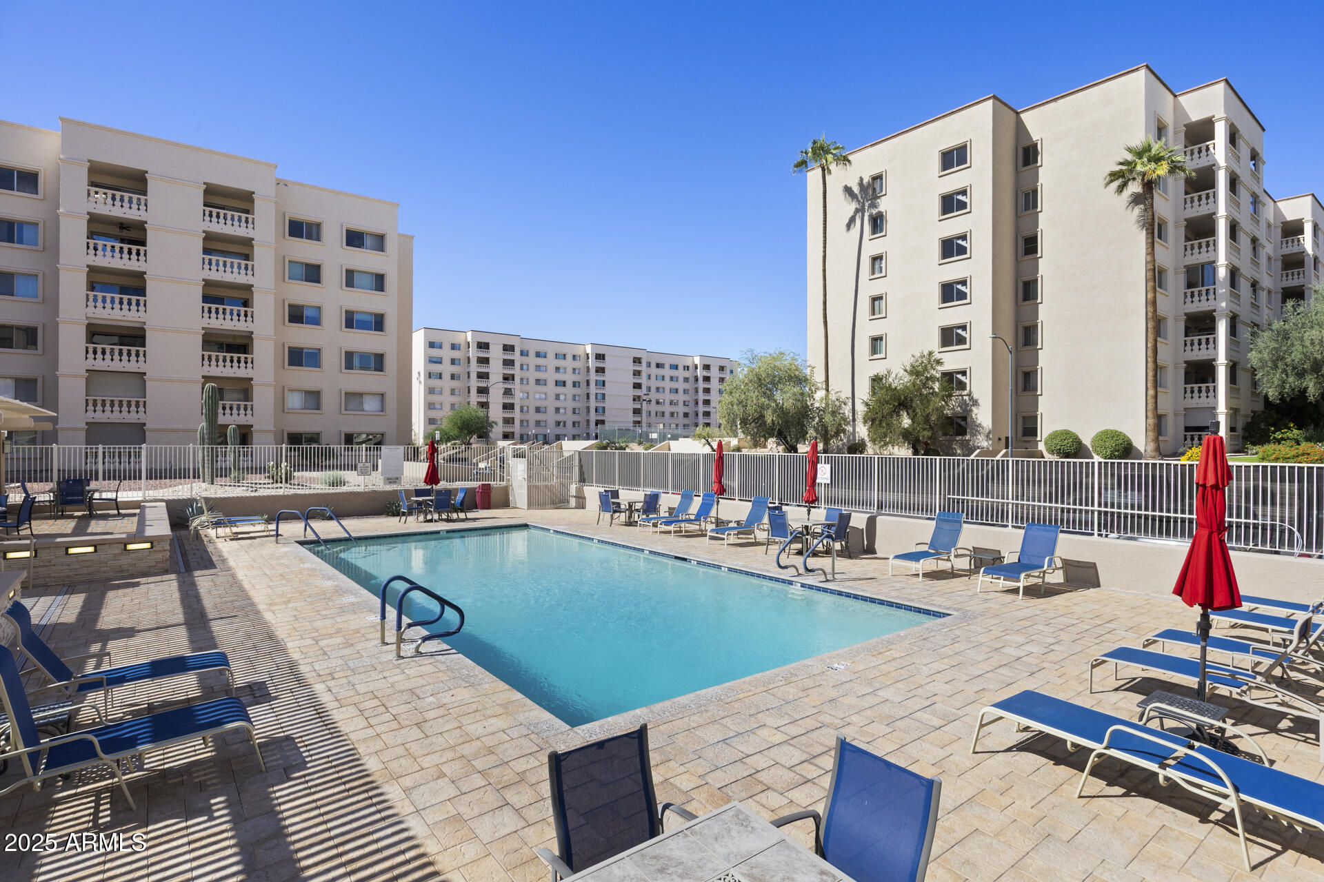 7820 East Camelback Road, Unit 211 Scottsdale, AZ 85251 - Photo 1 of 52 a view of swimming pool with outdoor seating