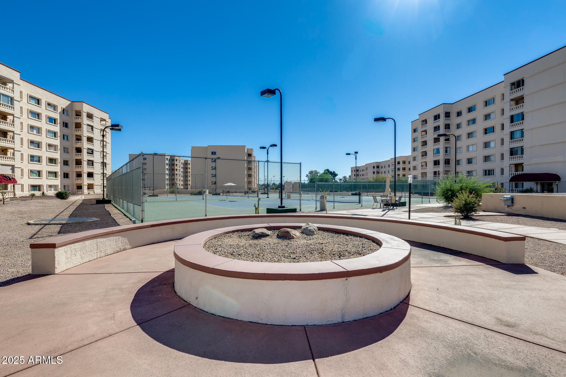 7820 East Camelback Road, Unit 211 Scottsdale, AZ 85251 - Photo 10 of 52 a view of a swimming pool with a patio