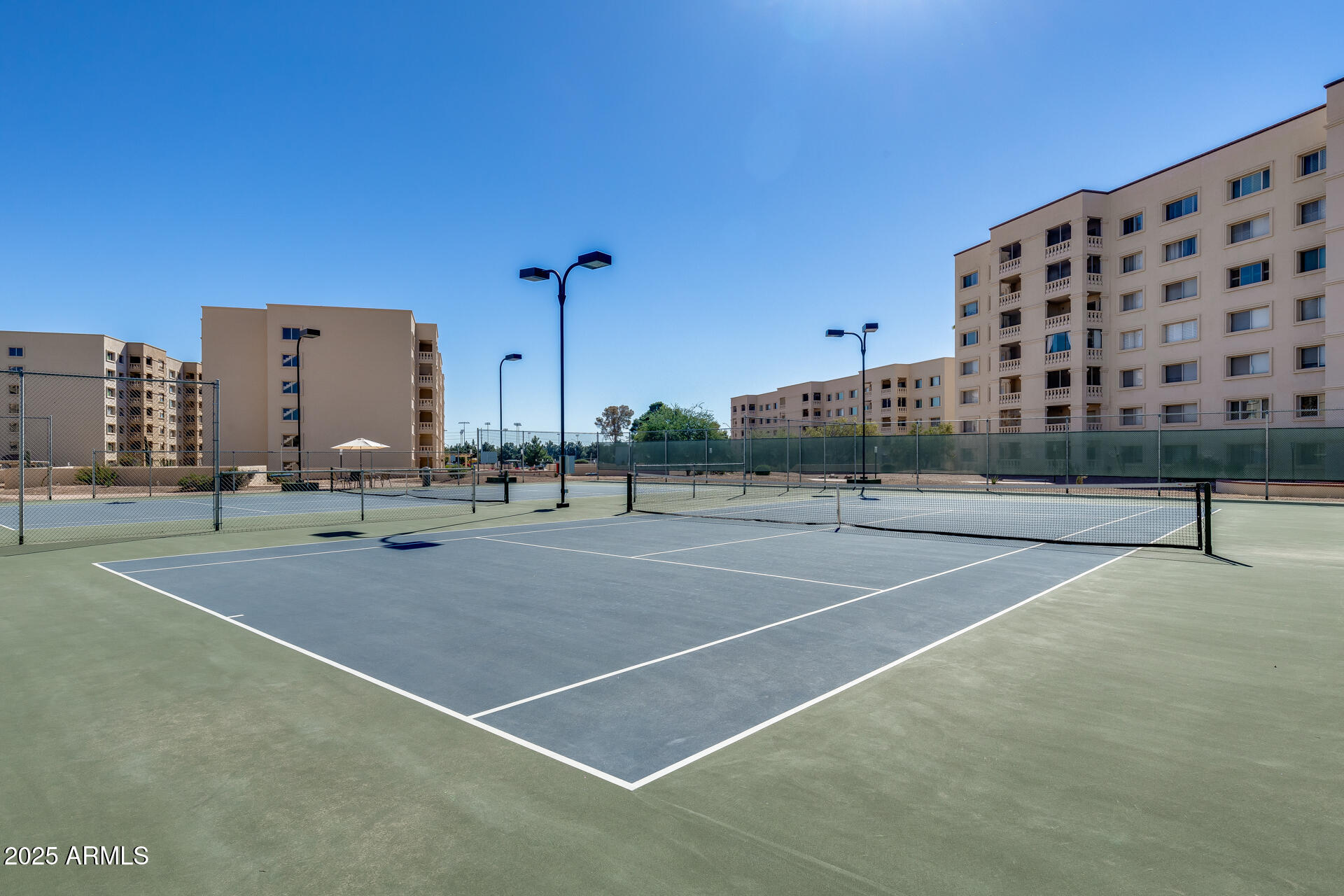 7820 East Camelback Road, Unit 211 Scottsdale, AZ 85251 - Photo 11 of 52 a view of a tennis court