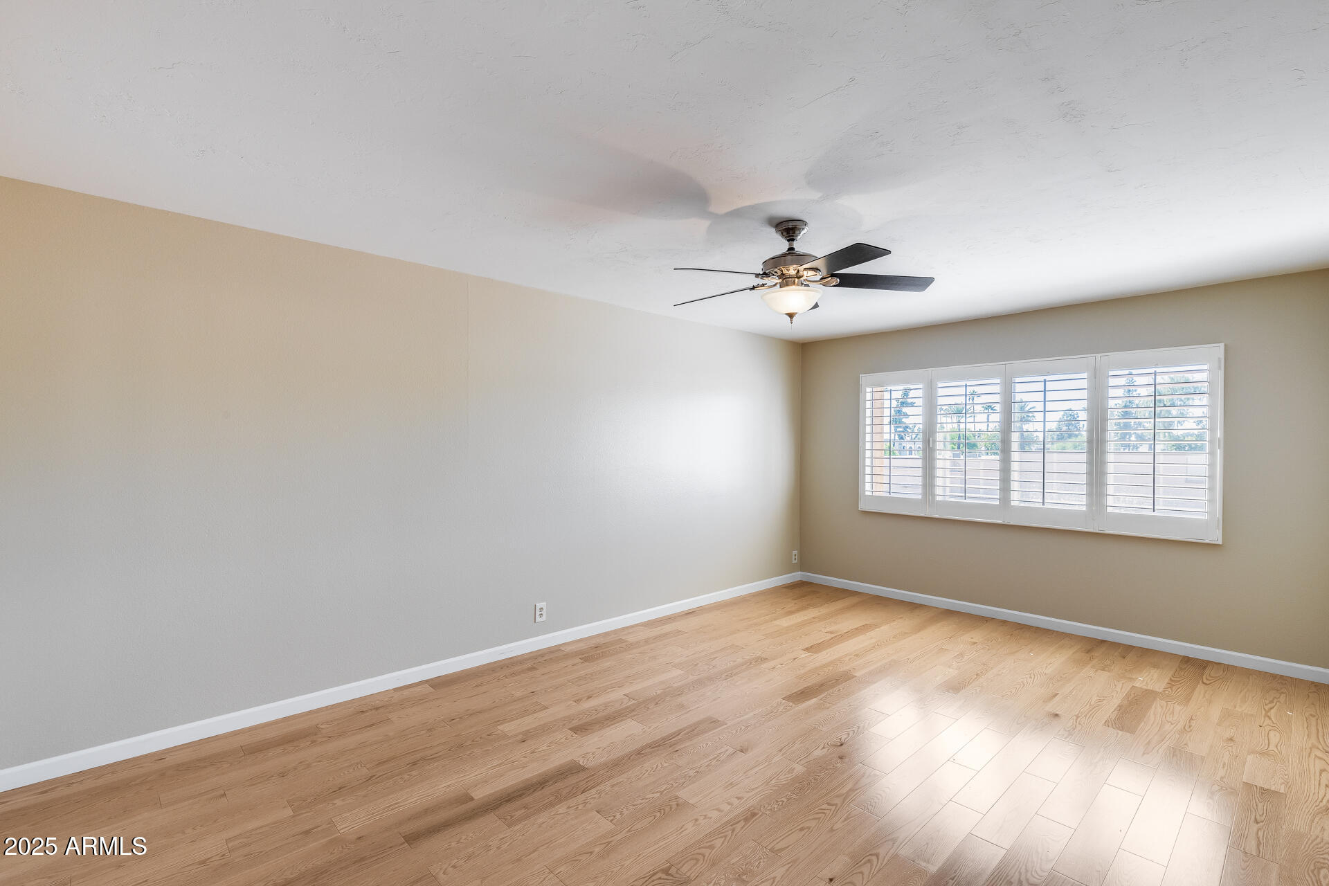 7820 East Camelback Road, Unit 211 Scottsdale, AZ 85251 - Photo 36 of 52 a view of an empty room with a window