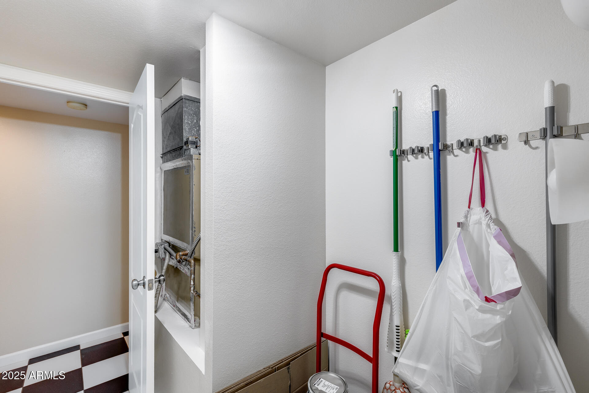 7820 East Camelback Road, Unit 211 Scottsdale, AZ 85251 - Photo 40 of 52 a view of walk in closet with clothes and shoes