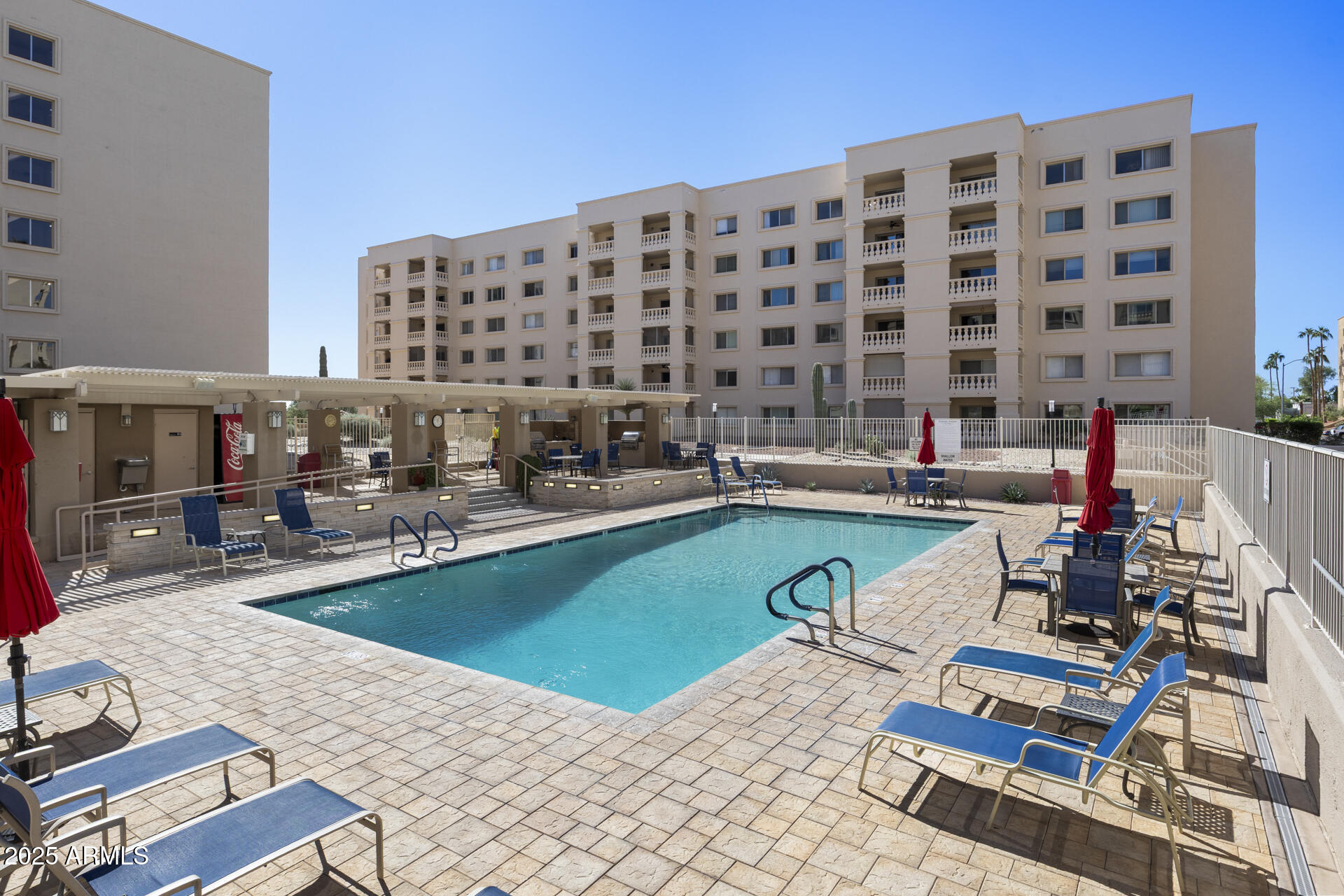 7820 East Camelback Road, Unit 211 Scottsdale, AZ 85251 - Photo 46 of 52 a view of swimming pool with outdoor seating