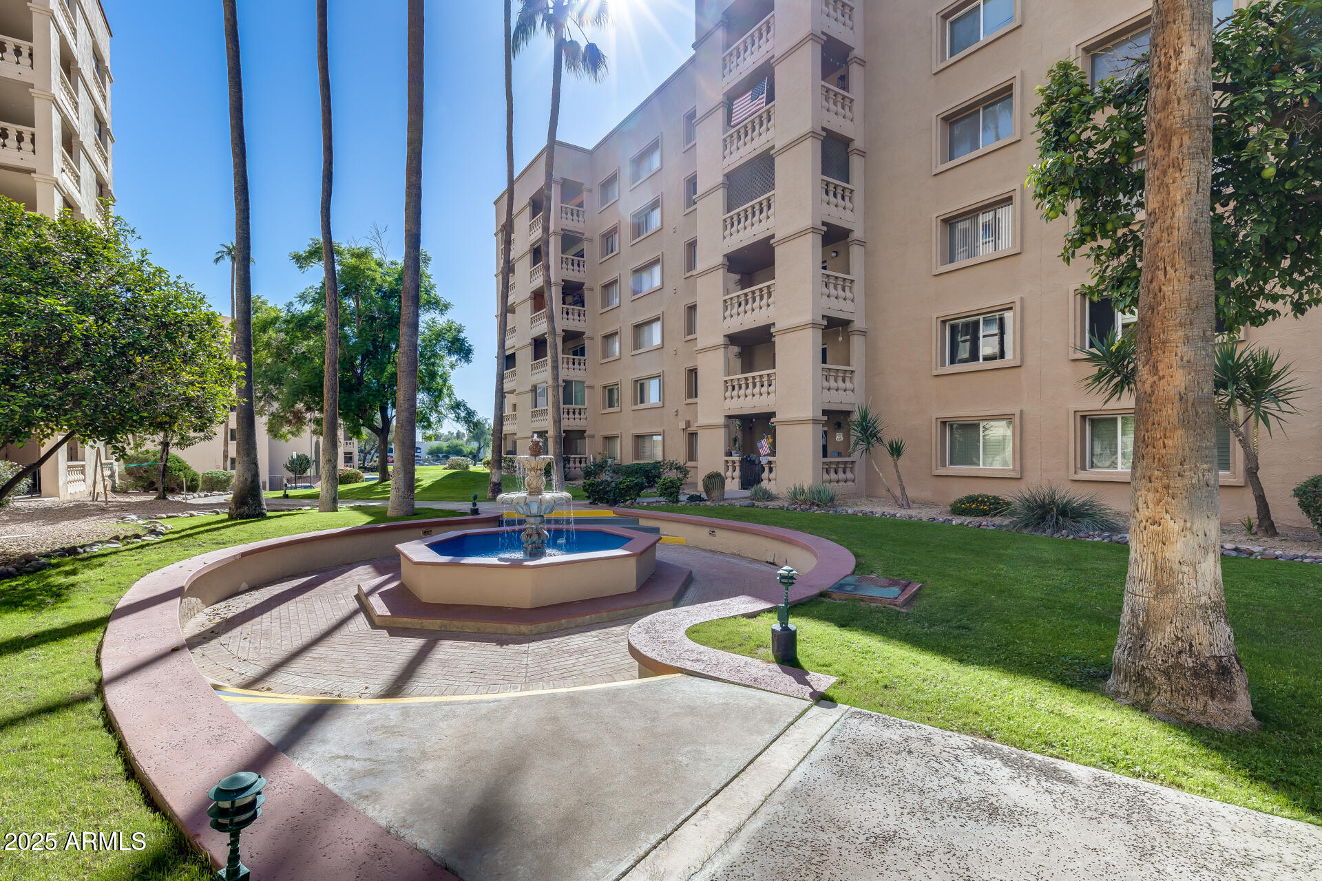 7820 East Camelback Road, Unit 211 Scottsdale, AZ 85251 - Photo 6 of 52 a building view with a garden space
