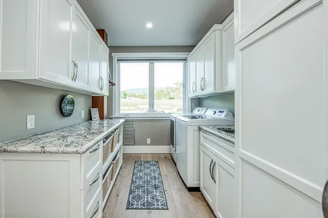 a kitchen with a stove a sink and a refrigerator