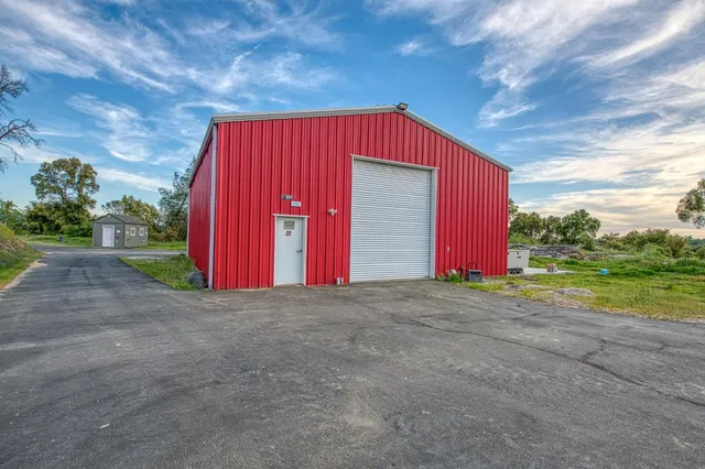 a view of a lake with green space