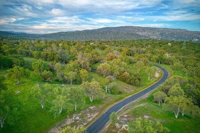 a view of a lake with a big yard