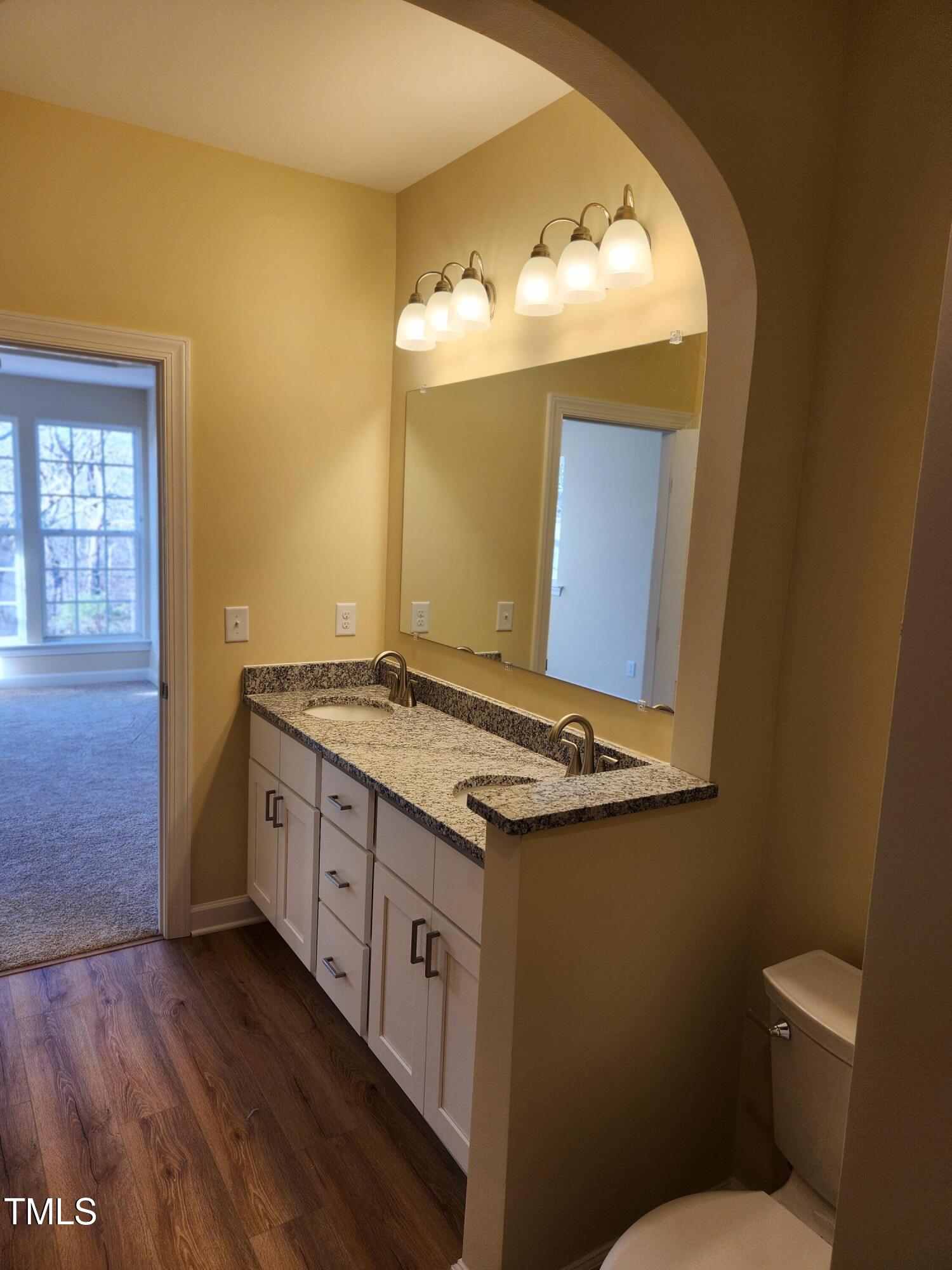 5409 Crescentview Parkway Raleigh, NC 27606 - Photo 22 of 46 Master bath to master bedroom