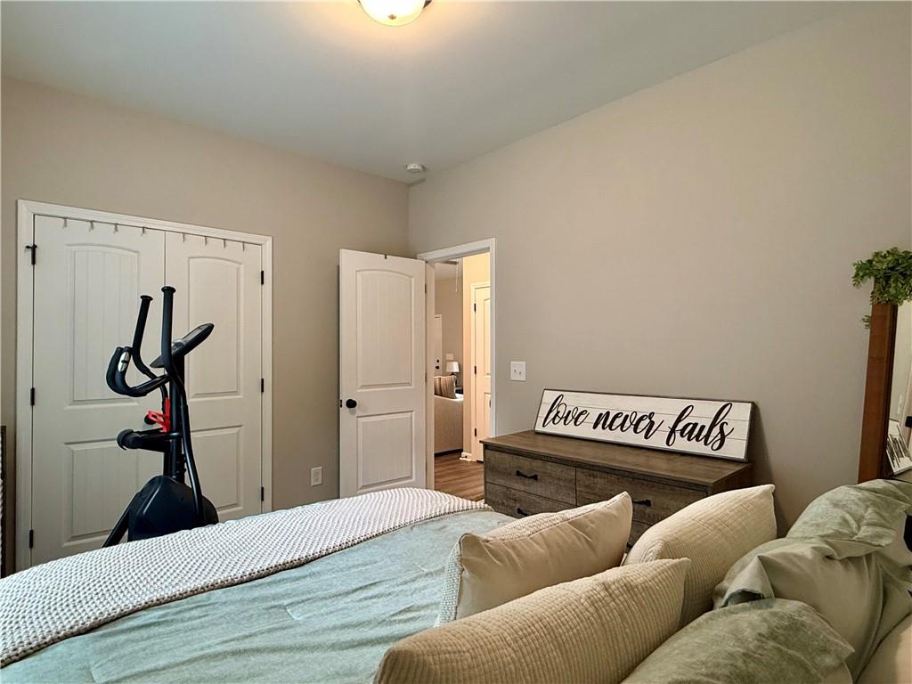 1776 Pleasant Grove Road Temple, GA 30179 - Photo 28 of 45 a bedroom with furniture and a wooden floor