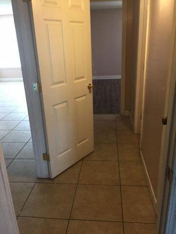 210 Pelham Road, Unit 107A Fort Walton Beach, FL 32547 - Photo 5 of 6 a view of a hallway