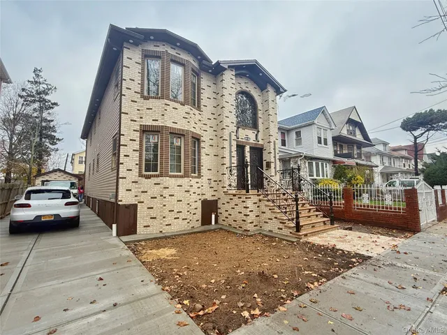 a view of a car park in front of a building