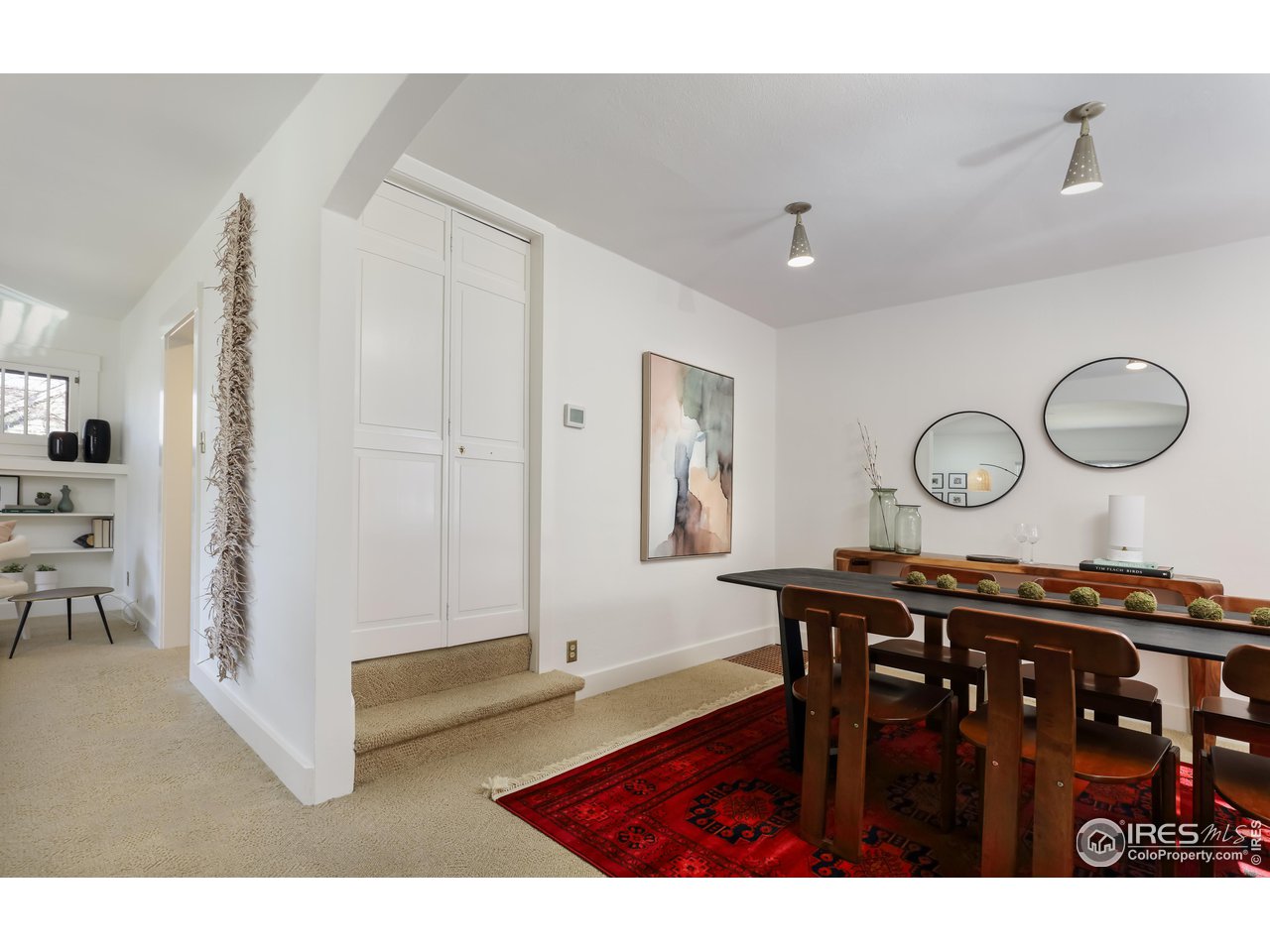 842 Grant Place Boulder, CO 80302 - Photo 11 of 40 a view of dining room and hall with furniture