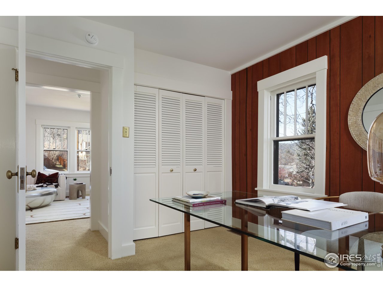 842 Grant Place Boulder, CO 80302 - Photo 13 of 40 a living room with furniture and a window