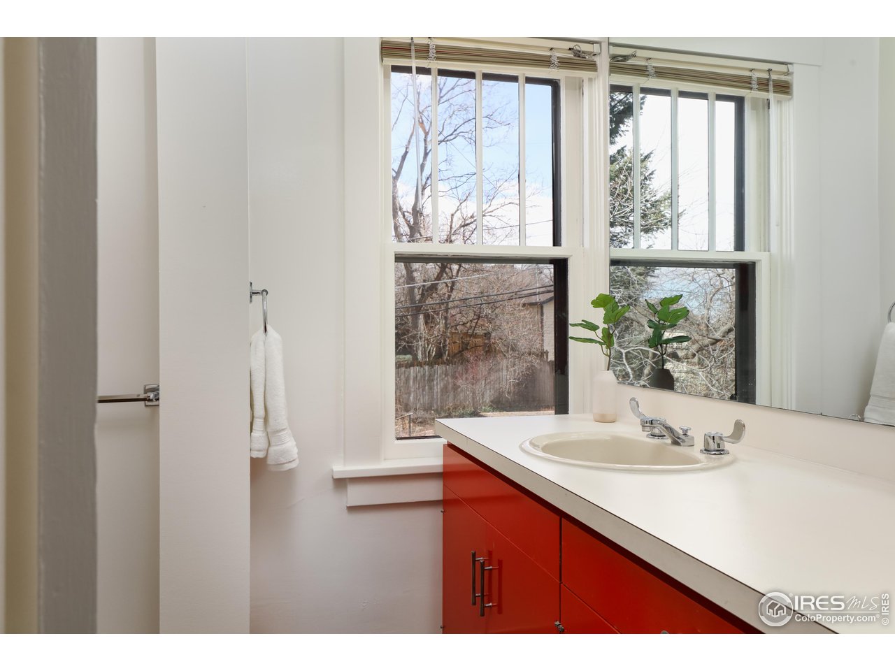 842 Grant Place Boulder, CO 80302 - Photo 22 of 40 a bathroom with a sink and a mirror