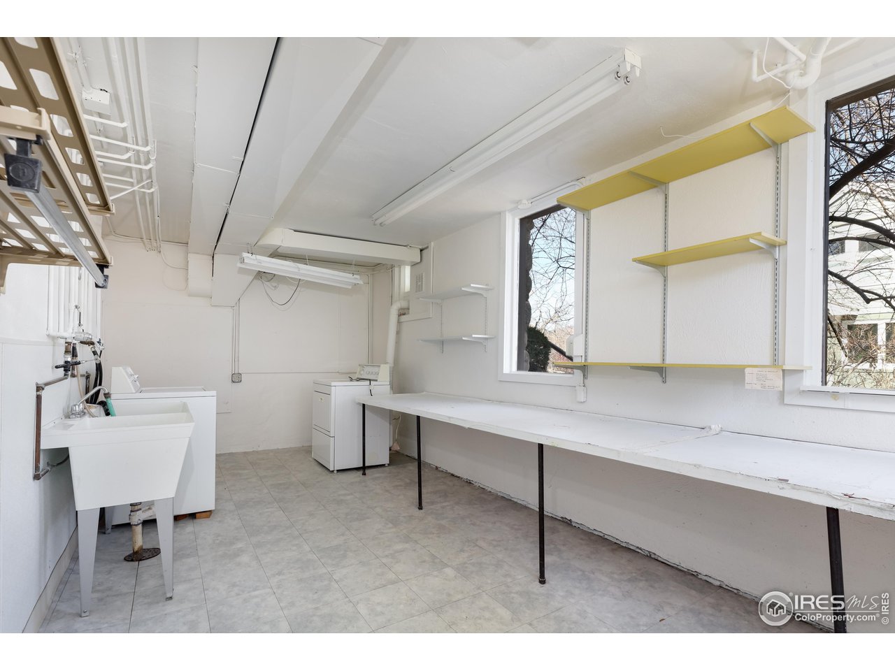 842 Grant Place Boulder, CO 80302 - Photo 29 of 40 a bathroom with a sink and a mirror