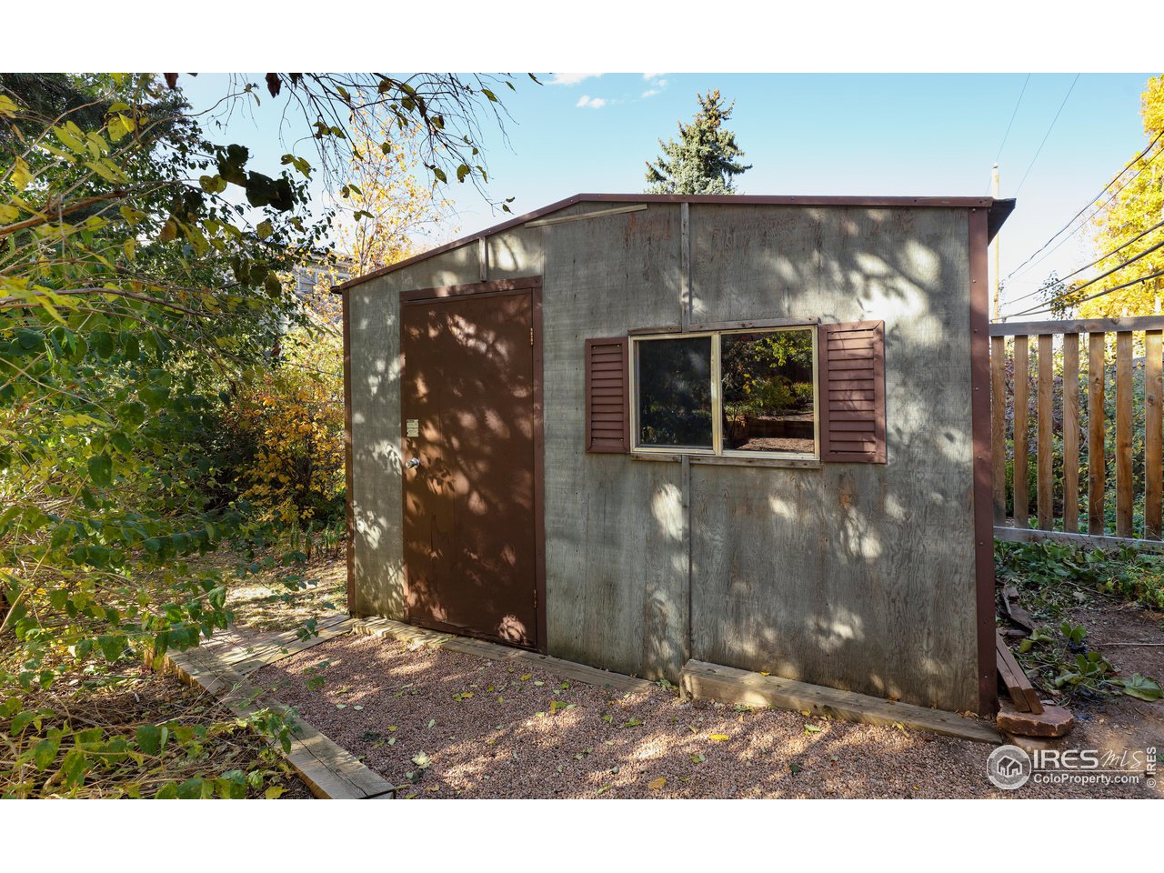 842 Grant Place Boulder, CO 80302 - Photo 40 of 40 a front view of a house with a yard