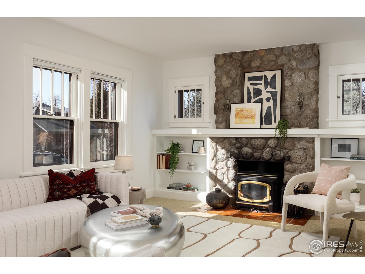 842 Grant Place Boulder, CO 80302 - Photo 6 of 40 a living room with furniture and a fireplace