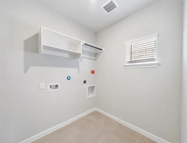 an empty room with shelves