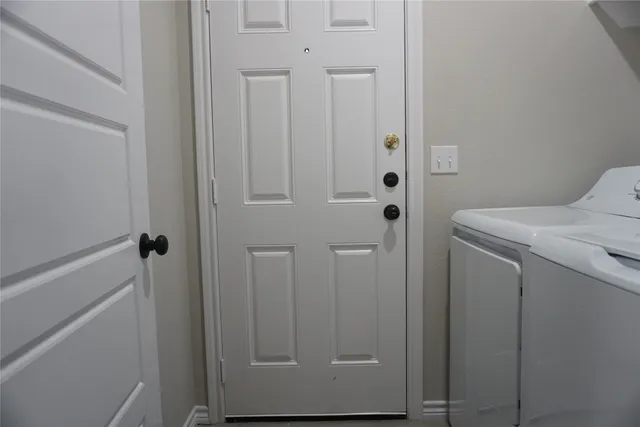 a view of walk in closet with window