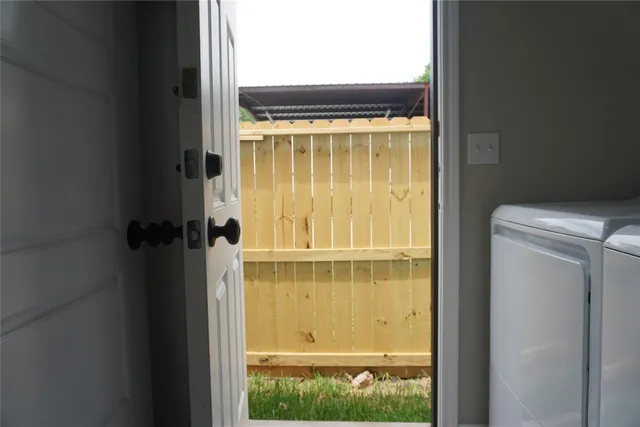 a view of a backyard with pathway