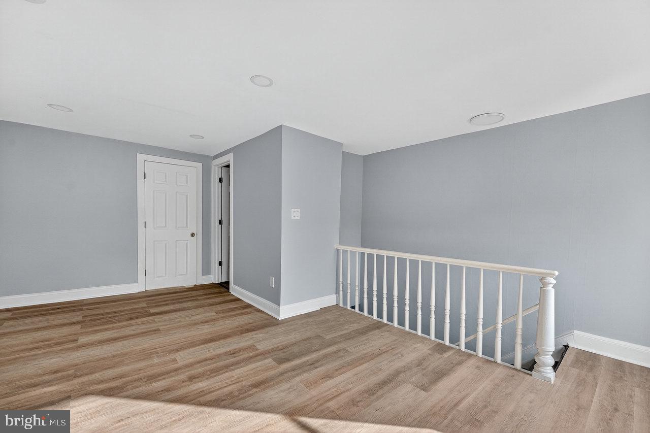 11 North Willow Street, Unit 3 Trenton, NJ 08608 - Photo 2 of 8 a view of a hallway with wooden floor