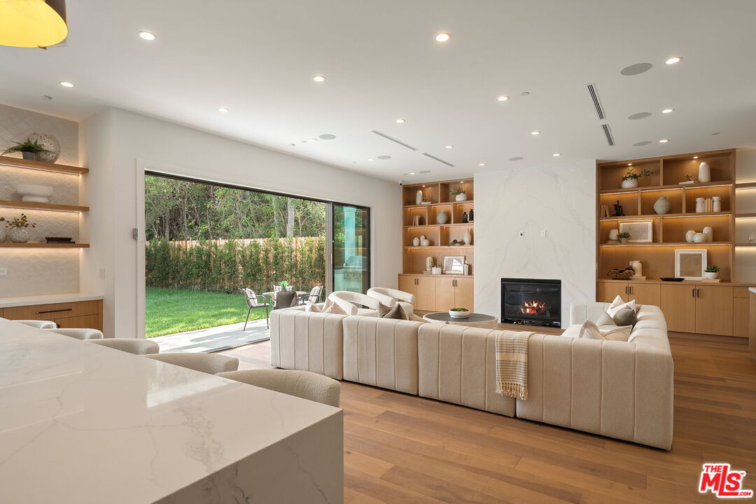 1742 Preuss Road Los Angeles, CA 90035 - Photo 18 of 50 a living room with furniture and a large window