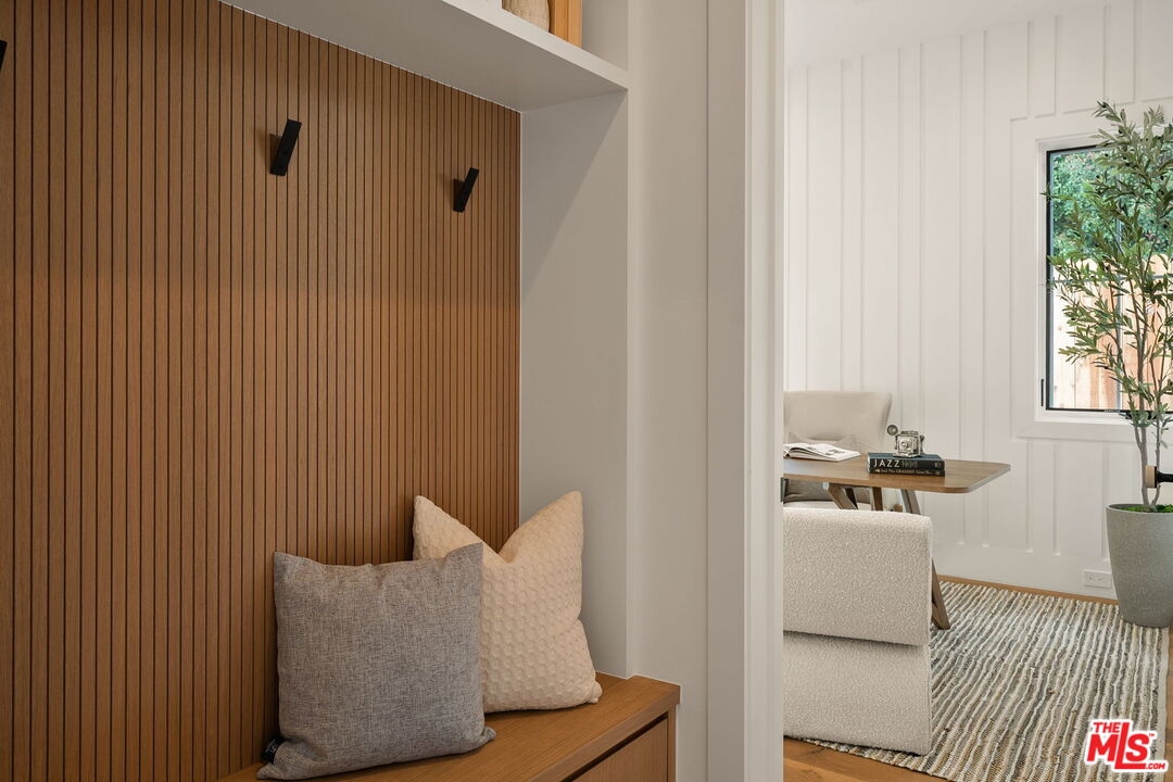 1742 Preuss Road Los Angeles, CA 90035 - Photo 6 of 50 a bedroom with furniture and a window