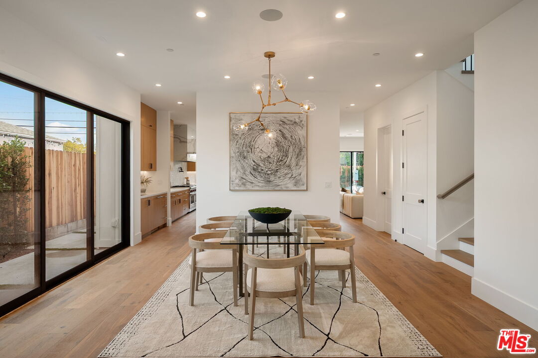 1742 Preuss Road Los Angeles, CA 90035 - Photo 10 of 50 a view of a dining room with furniture window and wooden floor