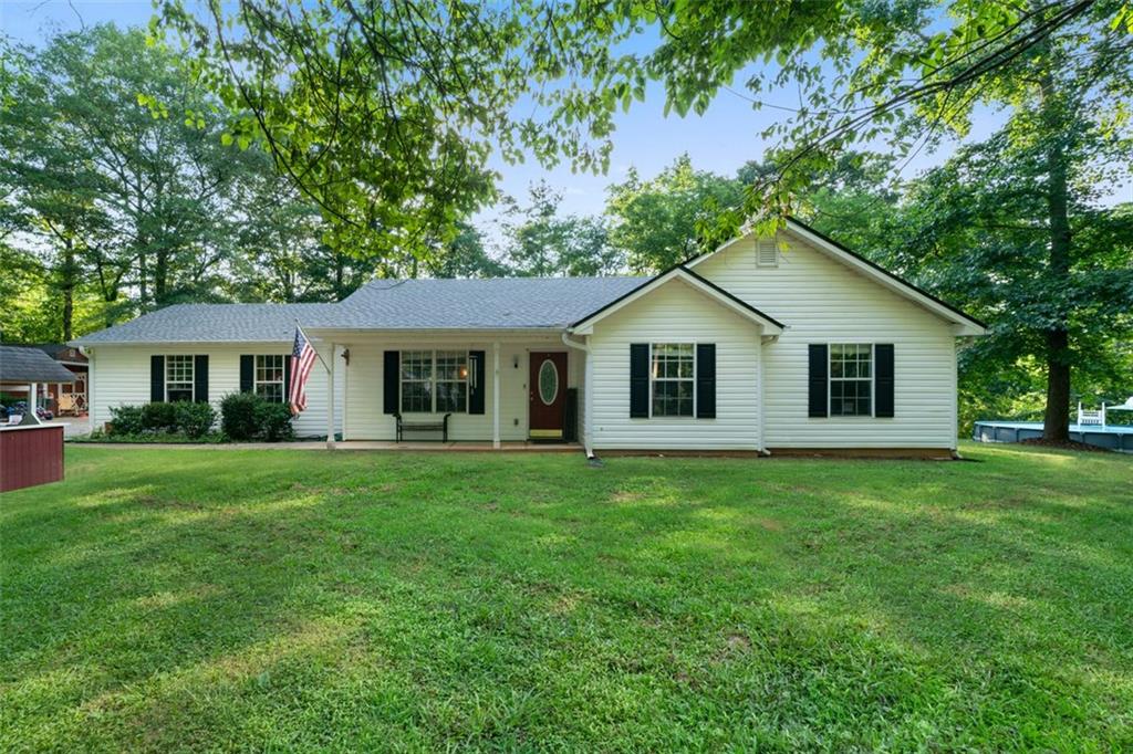 1643 Bar J Road Temple, GA 30179 - Photo 1 of 1 a view of a house and a yard with green space