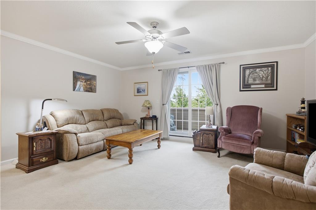 1 Coraopolis Road, Unit 200 Coraopolis, PA 15108 - Photo 4 of 25 Spacious living room with ceiling fan
