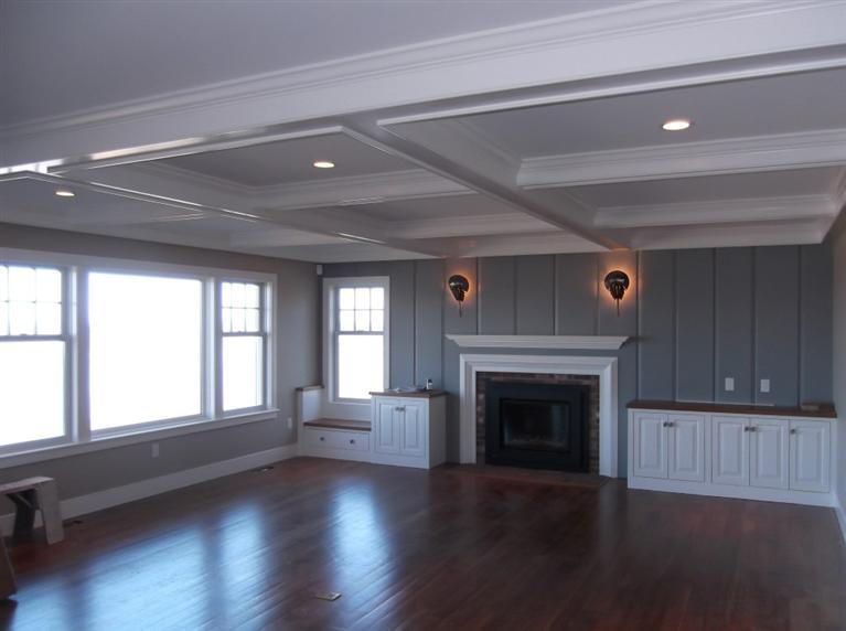 225 Sparrow Road Eastham, MA 02642 - Photo 16 of 29 wooden floor fireplace and windows in an empty room