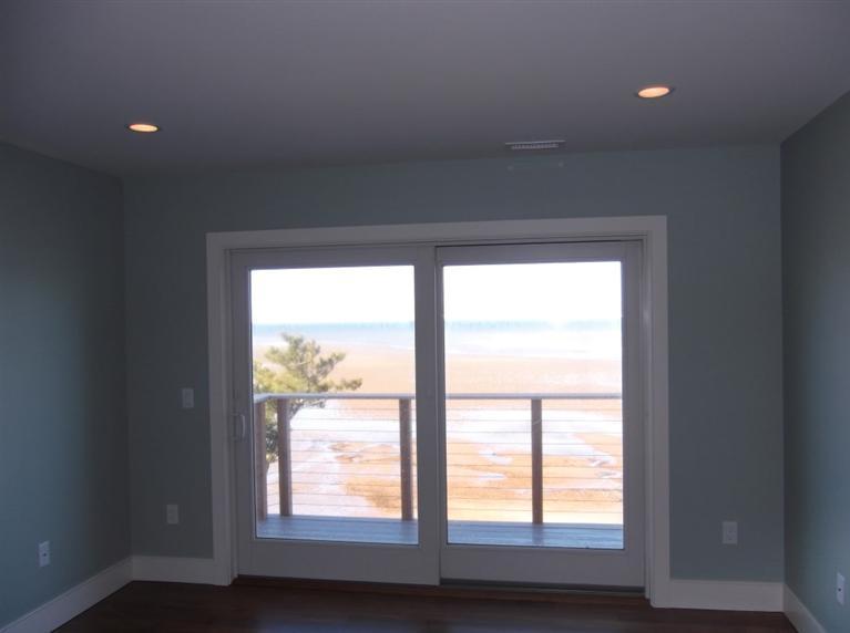 225 Sparrow Road Eastham, MA 02642 - Photo 24 of 29 a view of an empty room and a window