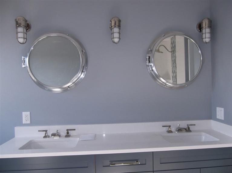 225 Sparrow Road Eastham, MA 02642 - Photo 27 of 29 a bathroom with a sink and a mirror