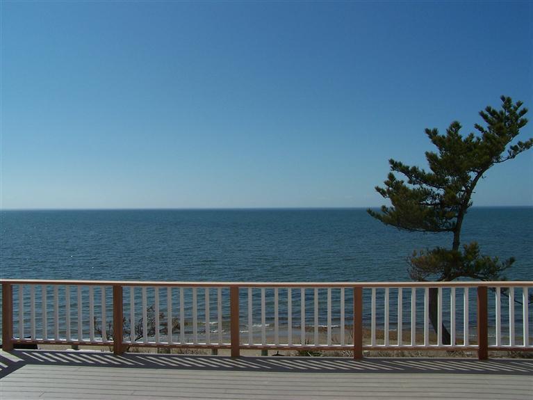 225 Sparrow Road Eastham, MA 02642 - Photo 4 of 29 a view of balcony with furniture