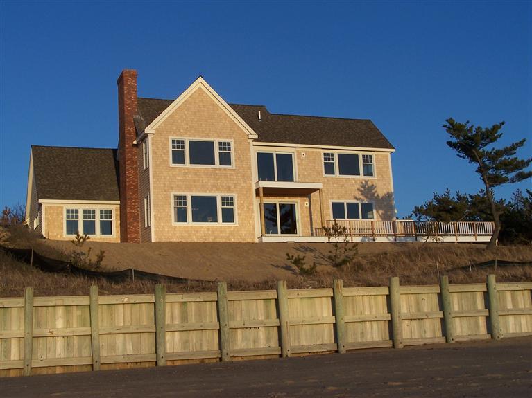 225 Sparrow Road Eastham, MA 02642 - Photo 6 of 29 a front view of a house with a yard