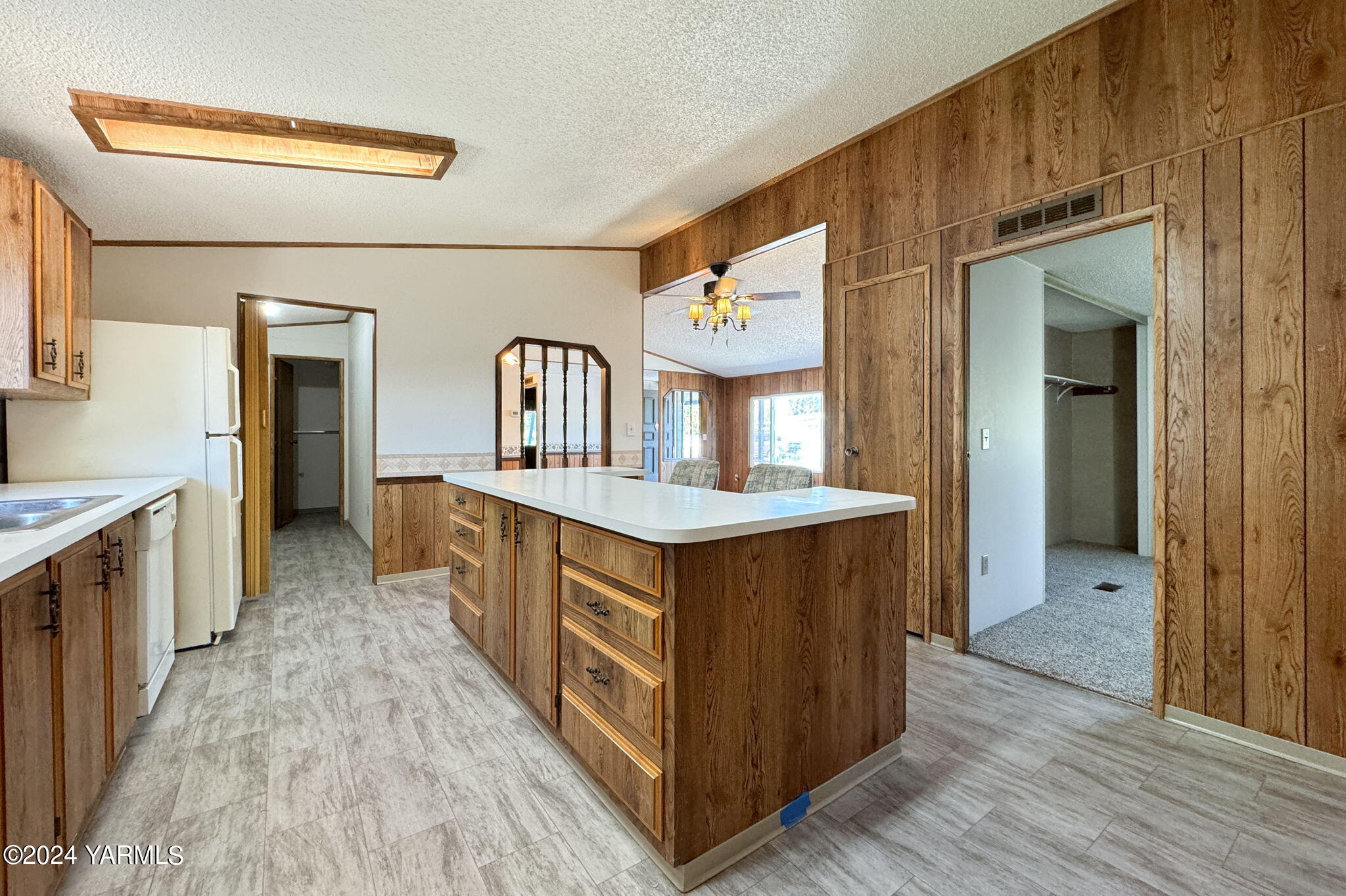 3701 Gun Club Road, Unit 54 Yakima, WA 98901 - Photo 11 of 17 a kitchen with stainless steel appliances granite countertop a stove and a sink