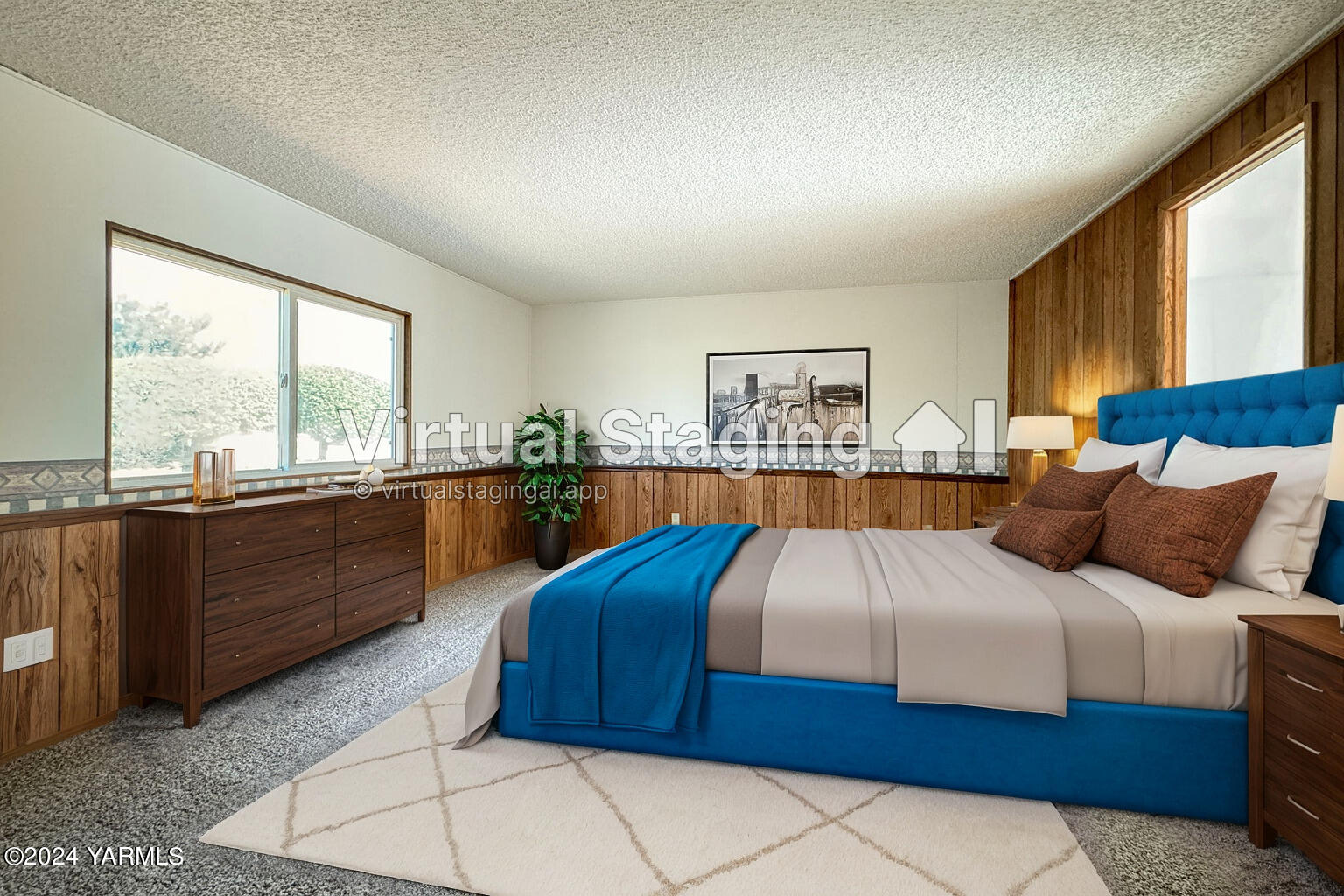 3701 Gun Club Road, Unit 54 Yakima, WA 98901 - Photo 12 of 17 a bedroom with a large bed and a large window