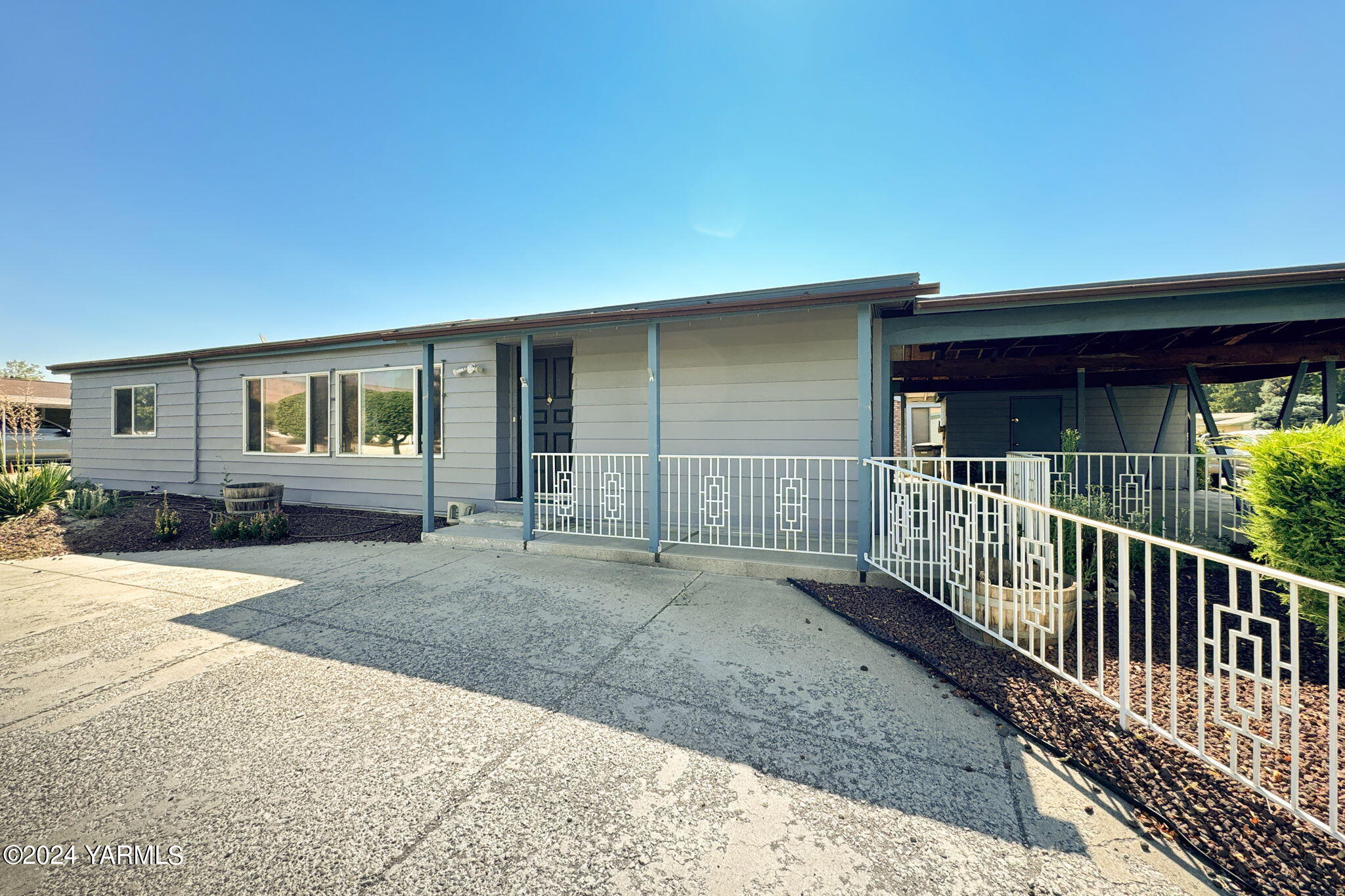 3701 Gun Club Road, Unit 54 Yakima, WA 98901 - Photo 4 of 17 a porch with view of outdoor space
